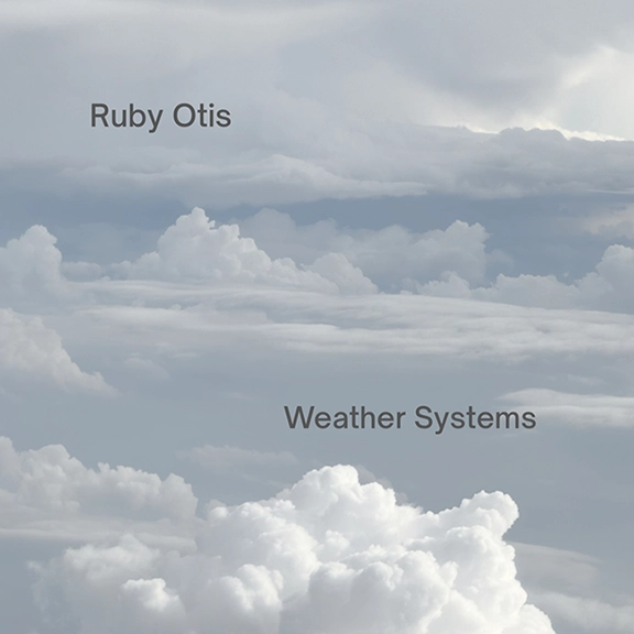 Aerial view of clouds in a blue-grey sky. Text reads, "Ruby Otis, Weather Systems"